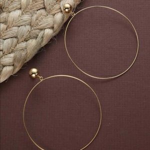 thin dainty large gold hoop earrings